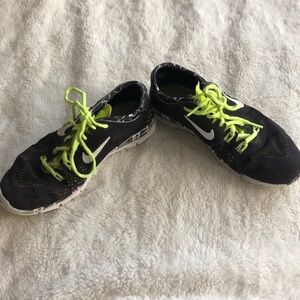 Lime Green‎ and Black Nike Shoes